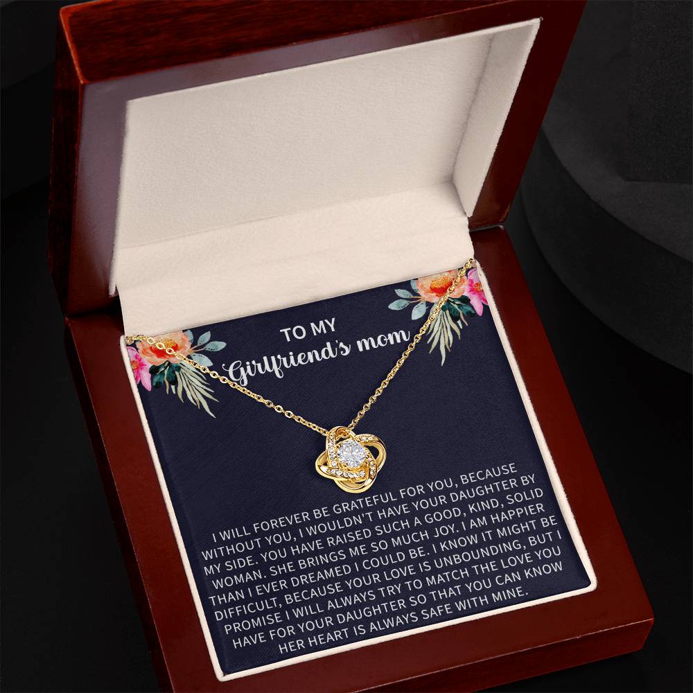 emotional gifting moment featuring a Giftsignature necklace for a girlfriend’s mom