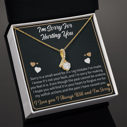 apology necklace displayed with a heartfelt message card expressing forgiveness