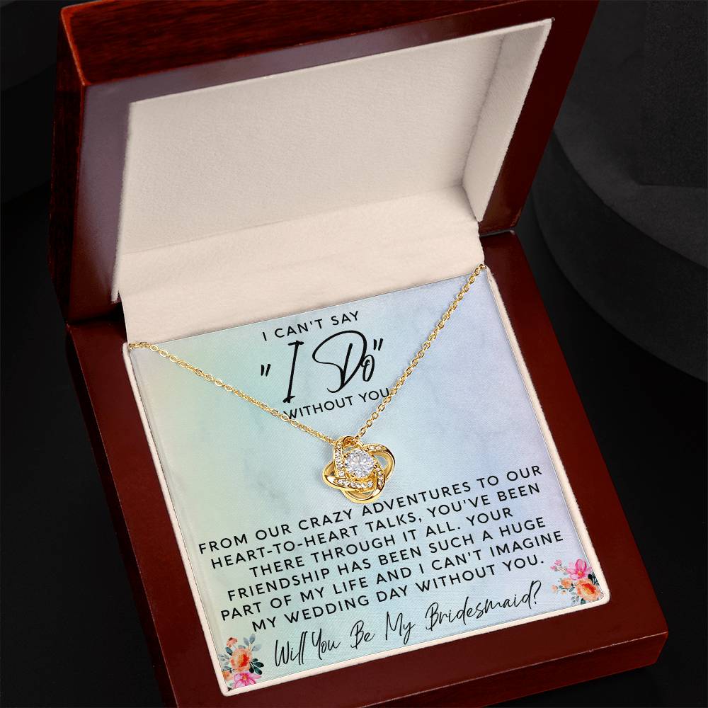 bride to be gifting a necklace to ask her bridesmaid in a special way