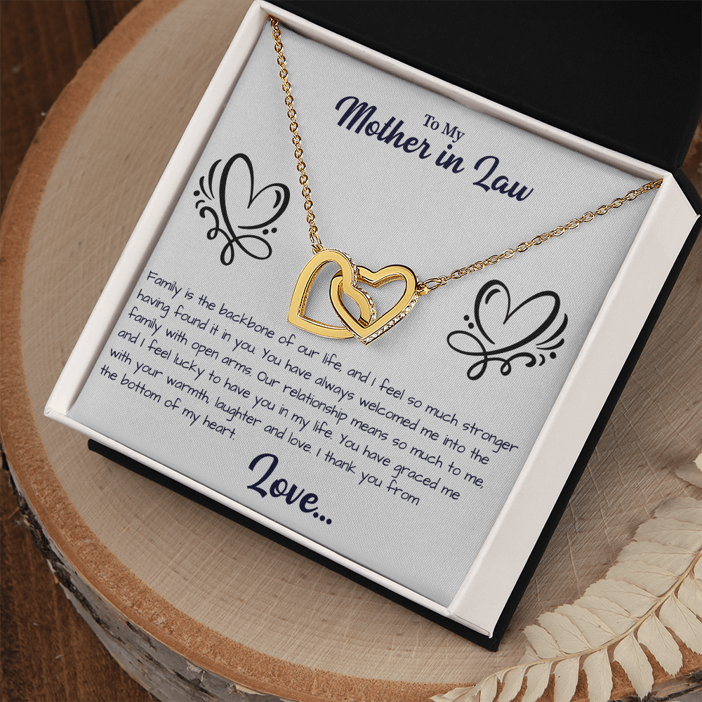 close up of interlocking hearts pendant chosen as a meaningful gift for mother-in-law