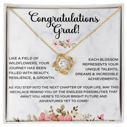 graduation necklace displayed with heartfelt congratulations message card