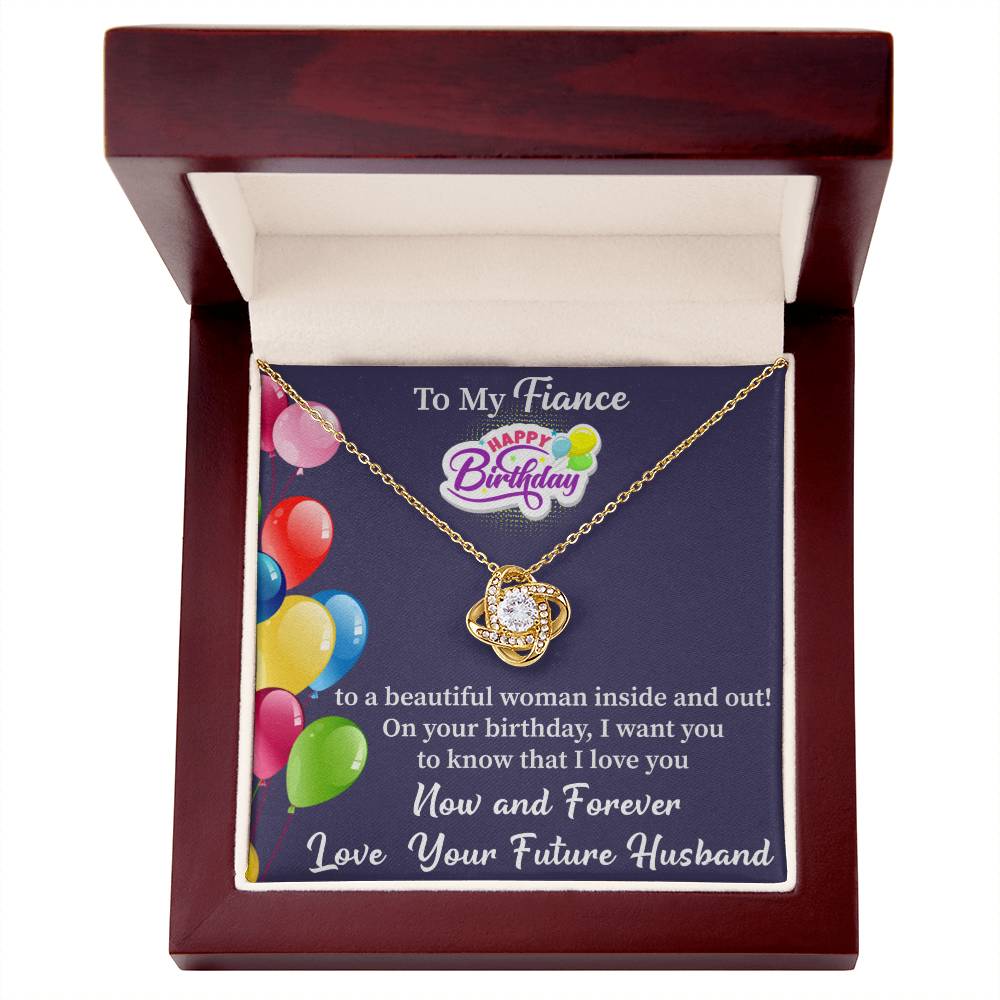 close up of love knot pendant necklace for fiancé