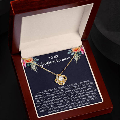 emotional gifting moment featuring a Giftsignature necklace for a girlfriend’s mom