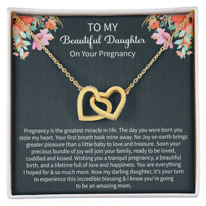 Giftsignature necklace presented in a gift box as a heartfelt pregnancy gift for a daughter