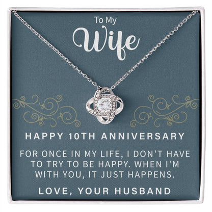 love knot necklace celebrating a happy 10th wedding anniversary with a heartfelt message
