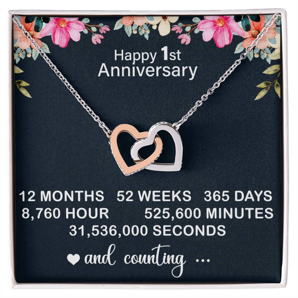 interlocking hearts necklace displayed as a 1 year anniversary gift