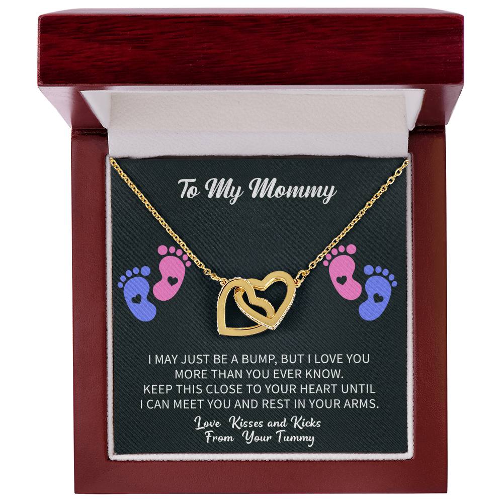 emotional gifting moment showing a Giftsignature necklace given to a mommy to be