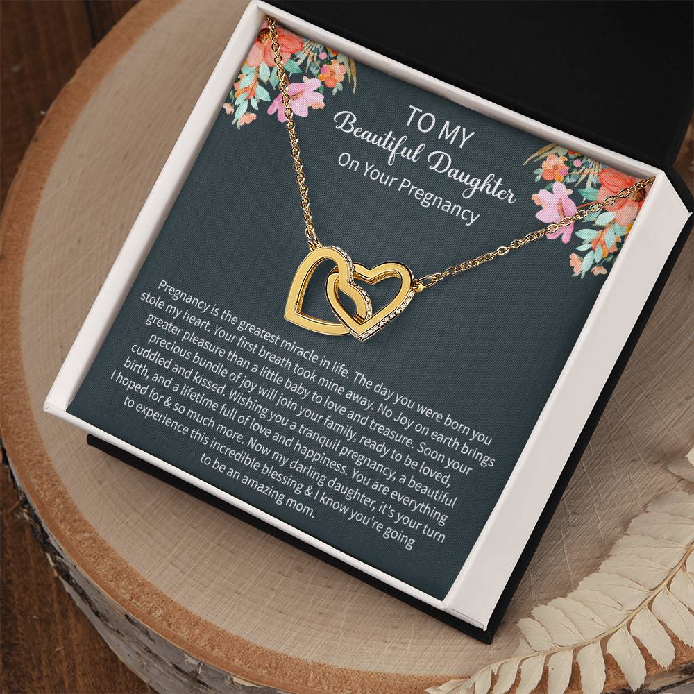 close up of a Giftsignature necklace symbolizing love and support for a daughter expecting her first baby