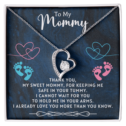 to my mommy necklace from unborn baby displayed as a sentimental gift